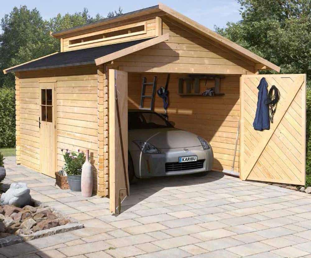 Exemple de garage en bois avec toit double pente en bois massif ©Atrium Concept
